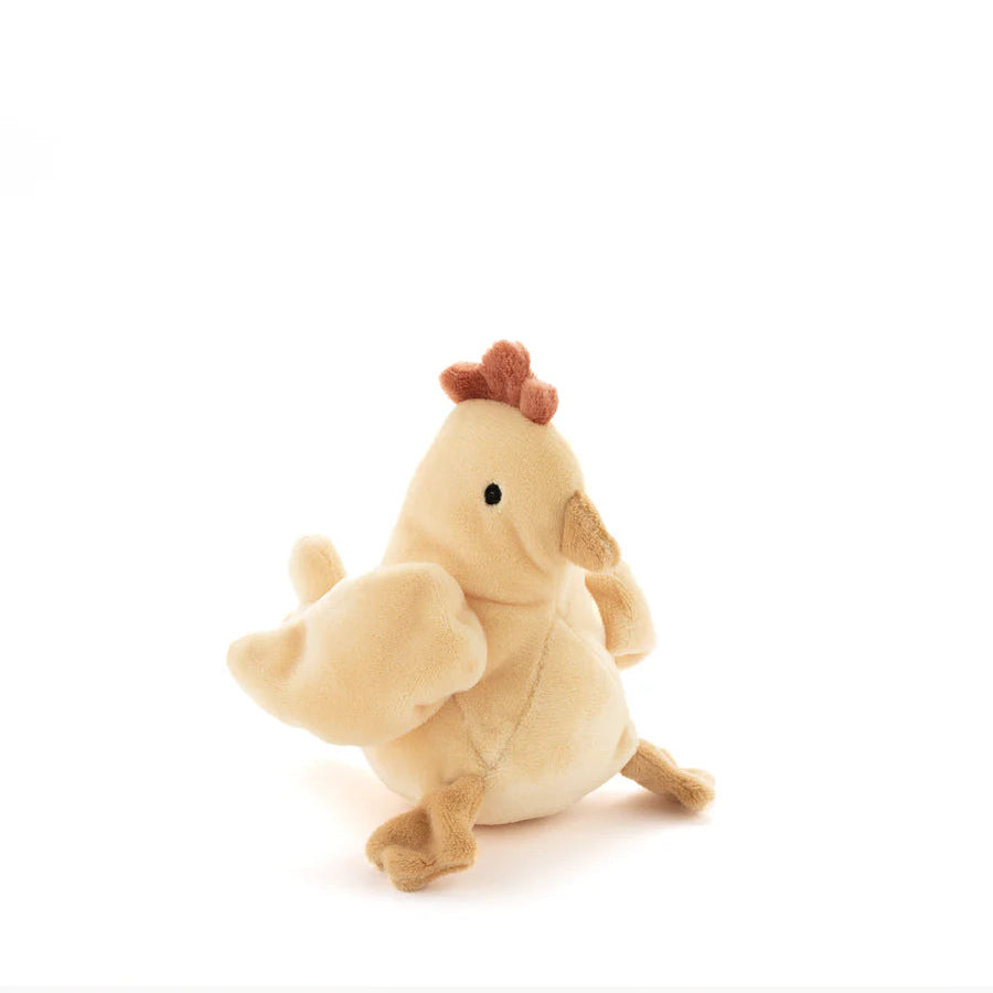 Plush toy chicken on a white background