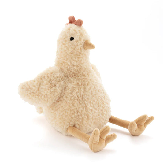 Plush toy chicken on a white background